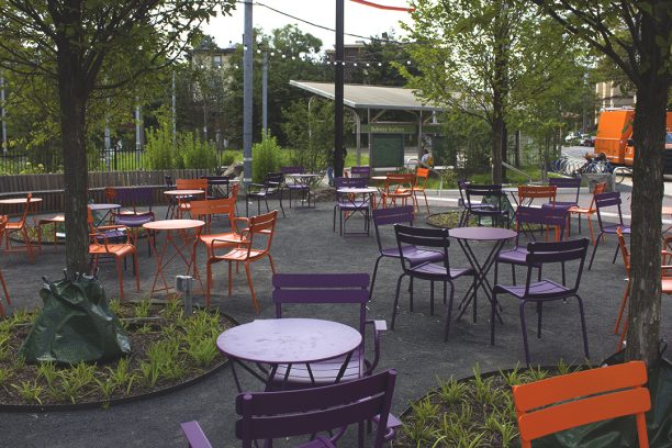 inviting outdoors space with chairs and tables near 40th Street and Baltimore Avenue
