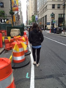 Person walkin in roadway in Center City Philadelphia
