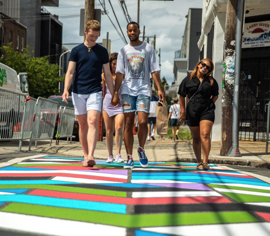 People walking on art crosswalk in Northern Libeties.