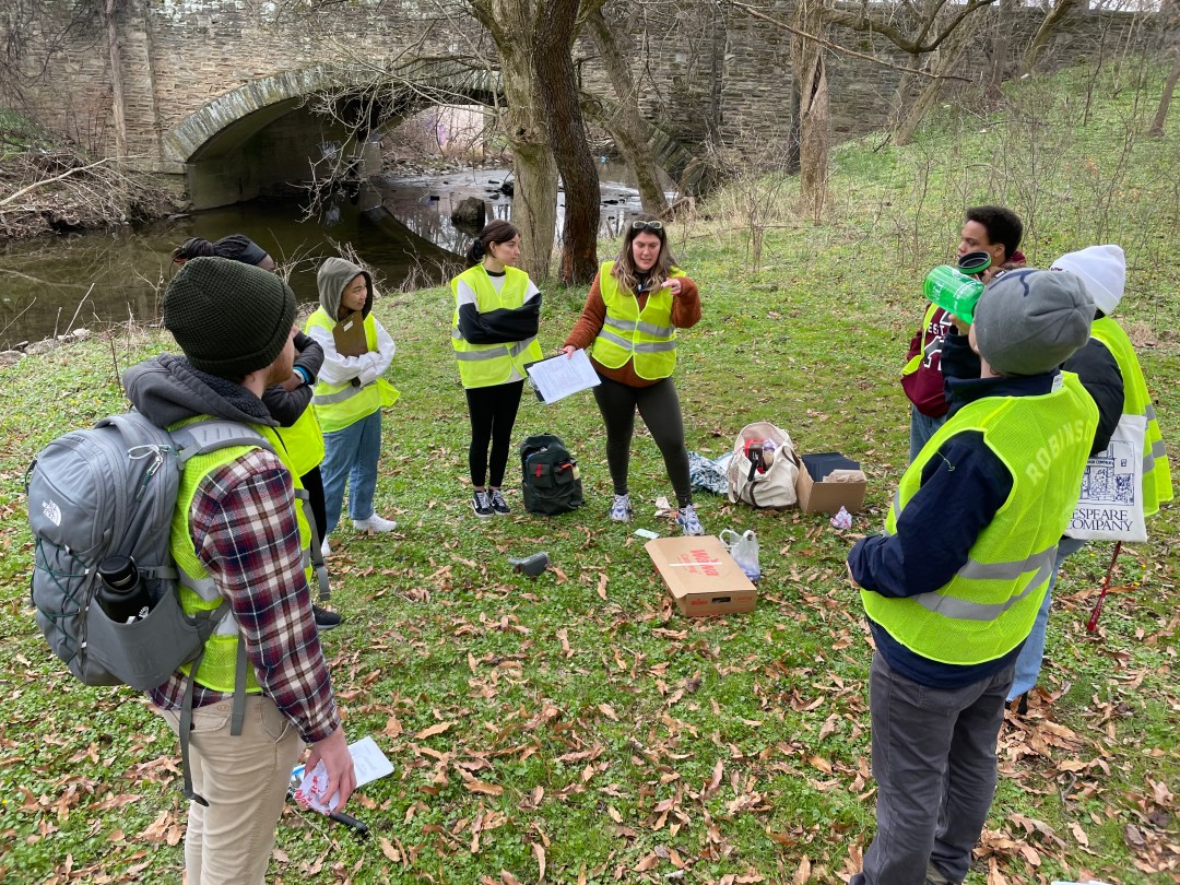 Volunteers conducting a walk audit near tacony creek park.